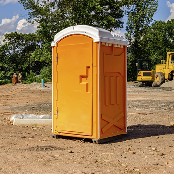 how often are the portable restrooms cleaned and serviced during a rental period in Hand County